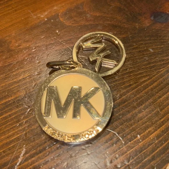Michael Michael Kors Saffiano leather w/branded feet, chain leather strap. P 2